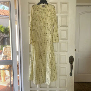 ASOS pale yellow polka dot dress size 2 runs big